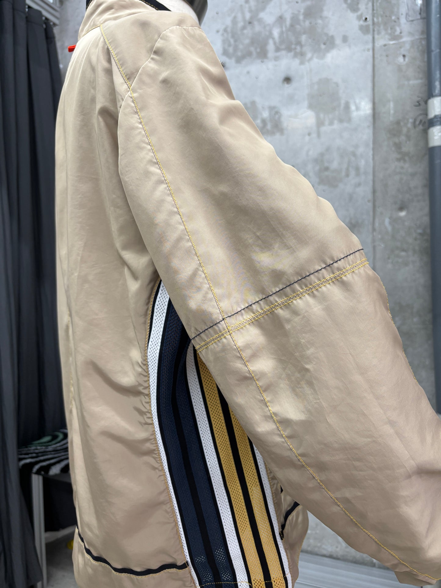 e2000s colour stitched jacket with mesh panels